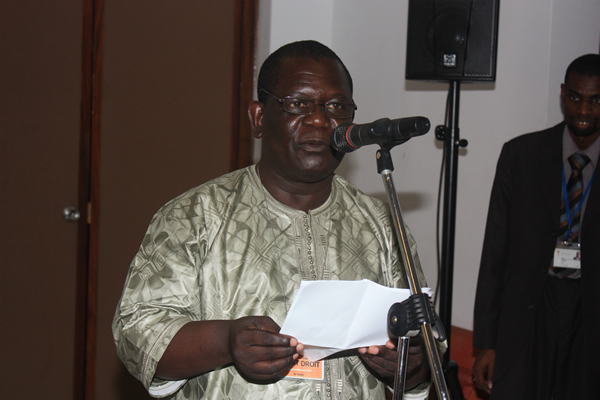 Mr Albert Bah reading his speech on behalf of recipients
